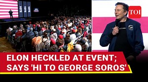 'Soros sleeper agent': #Musk jibes #DOGE hecklers at live event I Highlights #ElonMusk was heckled at a #Wisconsin rally, prompting him to sarcastically address his critics by saying, “Say hi to George [Soros] for me.” Musk criticised government waste and fraud while accusing the left of promoting “derangement.” Click to know more. #GeorgeSoros | The Times of India