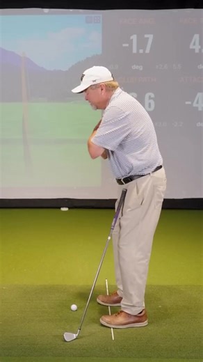 Perfect your backswing: Essential drill to maintain spine angle & stop head sway | Golf instructor tip