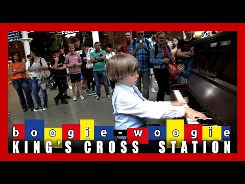 Public piano performance played boogie - woogie by Olivier (9 years old) at King's Cross Station