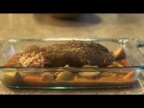 Pork Loin Roast with carrots and potatoes / Smothered in brown gravy!