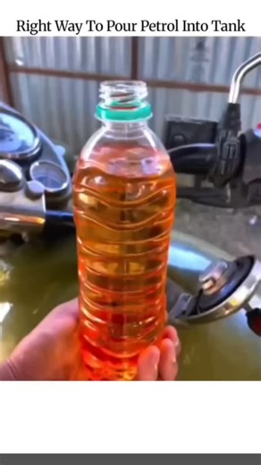 GLOBAL REEL HUB™™ on Instagram: "The video illustrates a DIY hack for spill-free fuel transfer: invert a plastic bottle of petrol directly into a motorcycle's tank neck, allowing gravity to pour contents while the tank rim supports the bottle body. Shared by media curator @YKwolfpec and credited to Mrresolve , the clip exploded to 399,000 views overnight, resonating with bikers facing common refueling spills in fuel-scarce or off-grid scenarios. Though effective for emergencies, this method risk