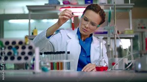 Medical scientist working in laboratory. Woman scientist medical research. Scientist carrying out scientific research in lab. Doctor scientist cure. Medical engineering. Medical researcher in lab Stock Video