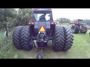 Case IH 7120 tractor and New Holland BR780 round baler hooking them up for haying (part 1 of 2)