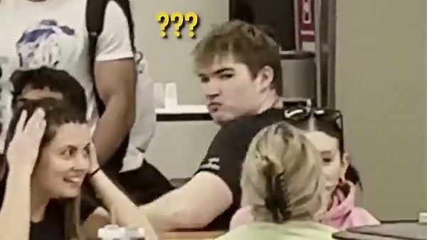 Violinist pranks as school cafeteria worker