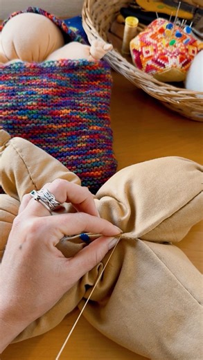 Waldorf Handwork by Chenoa Pelligra on Instagram: "The perfect stitch for beginners of all ages. The whip stitch is a simple and quick hand-sewing technique that wraps thread around the edges of two fabric pieces, creating a slanted, visible stitch on the outside that works well for fabric seams, or joining crochet/knitting projects. The needle goes in and out of the fabric edges, “whipping” the thread around the edges thus creating a secure seam. Here you can see I am using it to close up one o