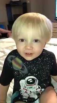 Baby Boy singing gospel hymn Victory in Jesus