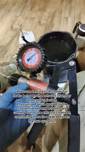 Blown EGR cooler. Pressure testing to find the cause of coolant loss. Volvo D5244T4 engine.