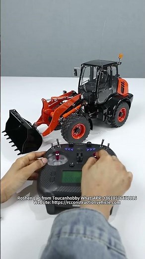 THIS 1/14 SCALE WA100 HYDRAULIC LOADER COMES IN A BRIGHT ORANGE FINISH, LOOKING VIBRANT. #rc #model