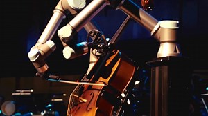 Cello Playing Robot Performs an Original Programmed Composition With the Malmo Symphony Orchestra