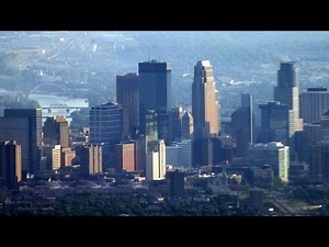 Downtown Minneapolis on flight to Kansas City: takeoff, climb, Missouri River, landing 2015-06-24