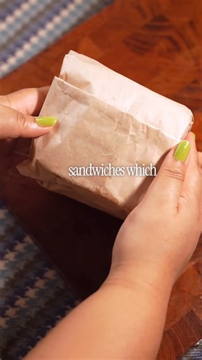 Sanjana Das on Instagram: "Tired of your sandwich falling apart by lunchtime? 🥪 Here’s a quick hack to wrap it like a pro: no mess, no soggy corners! Whether it’s for your lunchbox, picnic, or a quick grab-and-go meal, this trick saves the day every time! How to wrap your sandwich like a pro ⬇️ -Place the sandwich in the center of a large sheet of parchment paper or foil. -Fold the top and bottom edges up and over the sandwich so they overlap in the middle. -Fold the overlapping edges down and 