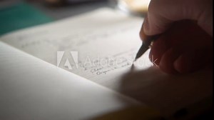 Writing, handwriting a daily schedule into a notes journal