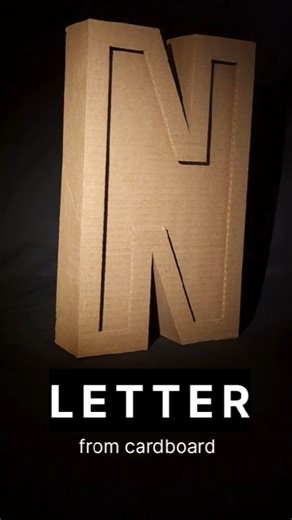 Made from cardboard, but looks way too good to toss. Save this idea! # #letterdecor #lettern #diy