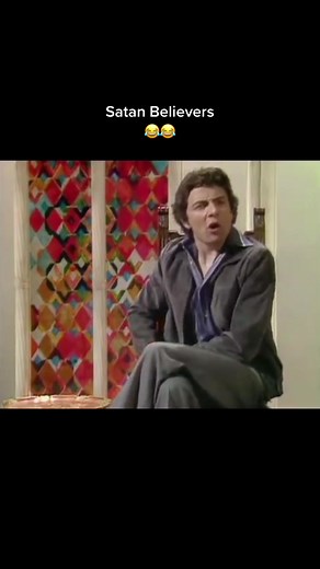 Rowan Atkinson Explains Devil Worship Beliefs
