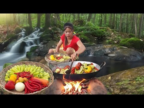 Yummy cooking vegetable with chili for lunch in forest