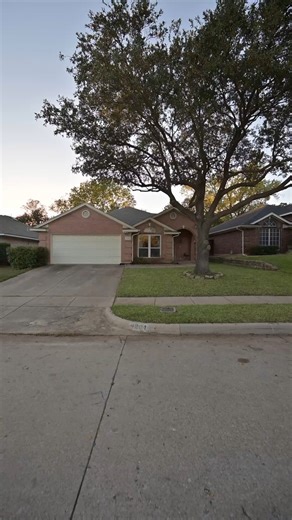 Just listed in the EXACT center of the DFW metroplex. You couldn’t get any more “centrally located” than this… also you can upgrade lots of stuff, but you can’t magically install big beautiful shade trees like this. And, that frameless shower… I dig it. EV charger, stainless appliances, granite counters, and great layout. Here are the specs: 📍List price: $395,000 📍3 beds 2 baths 📍1,947 sqft 📍Spacious living room with gas-burning fireplace, 📍Huge built-in bookshelves 📍Beautiful new windows 