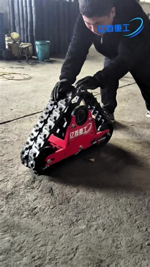 Modified Three-Wheeled Vehicle with Rubber Tracks