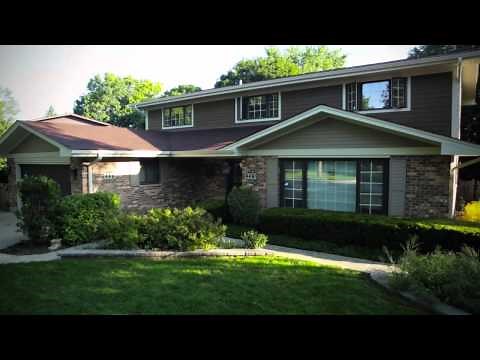 Exterior Home Renovation Transformation: Cedar Siding to Fiber Cement Siding