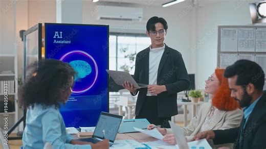 Asian businessman and multicultural team analyzing an AI brain visualization and digital data during a strategic corporate presentation. Focused on innovation and high-tech analytics in office