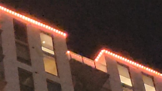 3.4K views · 11 comments | So, we were in downtown Austin last night . On our way to our car I noticed this building with red lights on it's top & what apperd to me to be some kind of programing in the lighting that was like a black bird. Rene & Ben thought it was real birds flying around & around the top of the building. What do you think ? | Sue Vallejo | Facebook