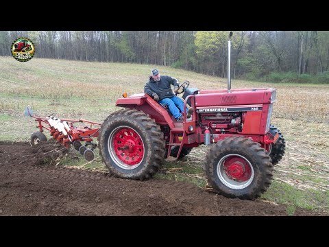 RARE International 786 Tractor with FWA Plowing