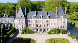 Aerial View Shot of Castle. Château de Courances (Domaine de Courances). French castle. drone aerial view with landscaped gardens and the surrounding area.