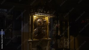 Religious women praying and baptising in front of the altar Stock Video