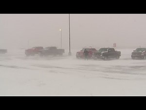 Blizzard conditions strand truckers and families in Brush