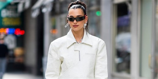 Dua Lipa Flawlessly Hops on the Pantaboots Trend in Tight Black Leggings