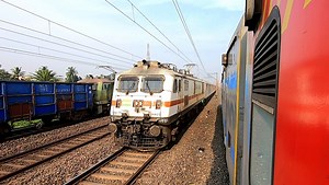 02302 New Delhi - Howrah Rajdhani Express brutally overtakes the bang on time running 02340 Dhanbad - Howrah Coalfield Express at 130 kmph. The legendary Coalfield Express was put on the slower track (with 110 kmph top speed) from Waria station. October, 2021 Device Used : GoPro Hero 7 BLACK | Biswajit Rail World