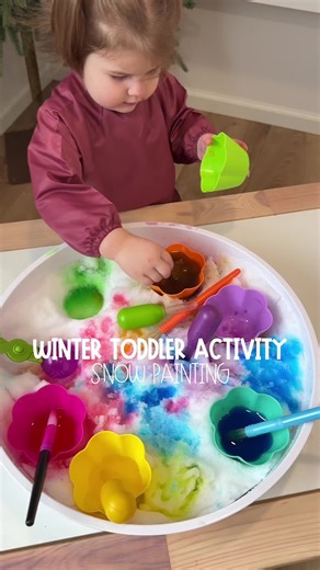 The easiest winter activity that actually kept my toddler busy ❄️👏🏻 I scooped some snow into our @Inspire My Play sensory bin, added cups (from hobby lobby), food coloring, @Learning Resources Inc. droppers, and paint brushes—and that was it. 3 minutes to set up, 45 minutes of play 🙌🏻 Sometimes the simplest activities are the ones they love the most. Ice cubes are another easy option to paint if you don’t have snow! ❄️ #toddleractivities #sensorybinideas #winteractivities #snowactivities #to