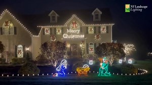 This display doesn’t hold back! From “Merry Christmas” in lights to a shining baby Jesus, it’s pure holiday cheer in full color! ✨🎄 #NYLandscapeLighting #HolidayLights #ChristmasDisplay #FestiveGlow #MerryAndBright #HolidayCheer #ChristmasVibes | NY Landscape Lighting LLC
