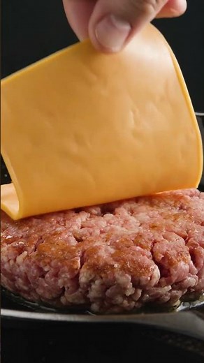 cooking of a smashed double cheeseburger