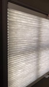 Norman® SmartFit® Shades with Frame. The innovative frame keeps the shade secure and perfectly in place, even when doors open or close. Perfect for French doors, entryways, or any space where beauty meets practicality. 📷: @coeurwindowcoverings | Norman USA
