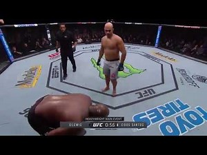 Derrick Lewis BAITS Junior dos Santos by faking injury!!!!