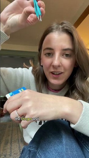 How to remove a bee stinger after being stung.