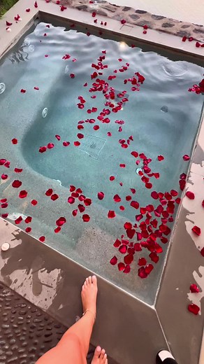 Relaxing Pool Experience with Rose Petals
