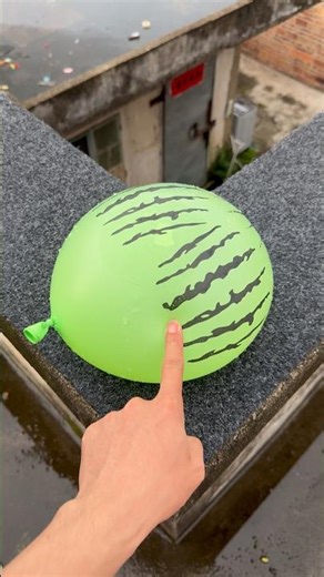 Experiment: Will a Water Balloon Explode If Rolled Down a High-Rise Building? 💥🎈 #experiements