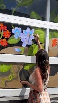 Painting a window splash at Panorama Music House in Lake Charles LA