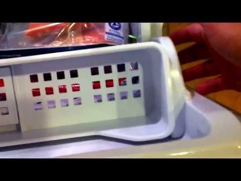 How to Remove the small tray in a RF Series Samsung Refrigerator Freezer