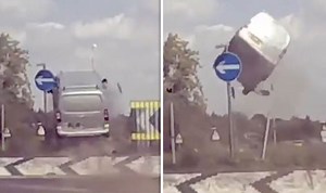 Van FLIES over roundabout in shocking video - three injured as poli...