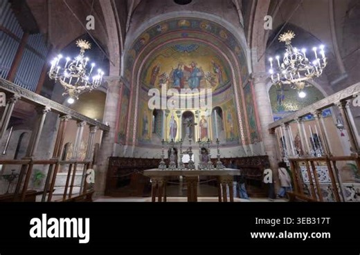 Modena, italy, april 11, 2026. Magnificent interior view of the romanesque modena cathedral in italy. Detailed golden mosaic in the apse above the altar Stock Video Footage - Alamy