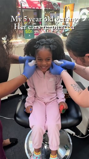 My babies got their ears pierced. My youngest was clearly over it 😂😭 those piercers did a great job and were very patient #earspeirced #girlmom #toddlersoftiktok #firstearpiercing #blacktoddlersoftiktok