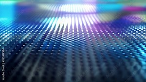 A detailed shot of a thin film of Quantum Dots carefully coated onto a glass substrate. The tiny dots are evenly spaced and arranged in a grid ready to be used in a display