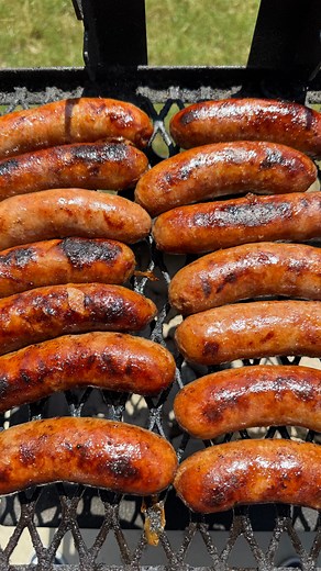 Matt Pittman - Meat Church on Instagram: "Beer Brats! One of my favorite foods for watching football. The Kings of Tailgating have tons of recipes great for watching football today at MeatChurch.com (link in 🅱️ℹ️🅾️). Onions caramelized in a @yeti 14 over a live fire on a @mill.scale yakitotori grill. Brats and @millerlite added. Cooked on both sides until 165° internal. Brats removed from the pan and grilled directly to crisp the casing. Served with delicious @schilosdeli mustard. 🔥 #MeatChur