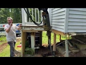 Porch Settlement Repair: Installing Helical Piers to Permanently Stabilize a Sinking Porch