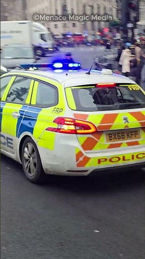Police Car Responding Urgently Through Whitehall!