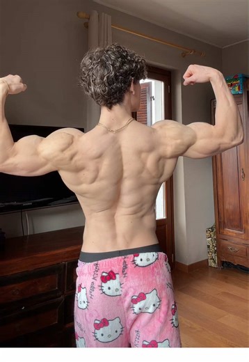 Better hello kitty pajama or the back? #fyp #trend #viral #abs #biceps | bicep