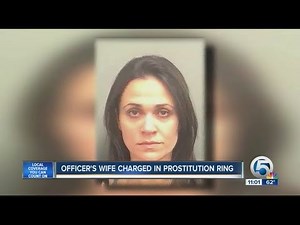 Officer's wife charged in prostitution ring