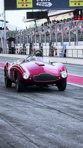 1953 Aston Martin DB2/4 Bertone Competition Spider through the pit lane!